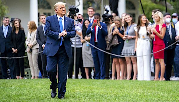 President Donald J. Trump walks across the South Lawn of the White House Thursday, Sept. 24, 2020, to board Marine One en route to Joint Base Andrews, Maryland, to begin his trip to North Carolina and Florida. (Official White House photo by Tia Dufour)